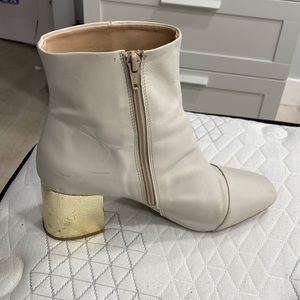 White heeled booties